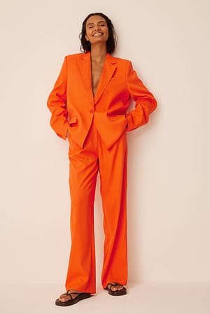 Orange Dressbukse med plisserte detaljer