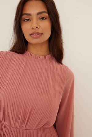 The Ultimate Guide to Styling a Pink Pleated Maxi Skirt