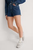 Mid Blue Raw Hem Vintage Look Denim Shorts