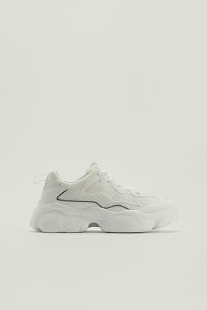 White Sneakers met reflecterende details