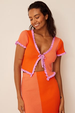 Orange/Pink Ribbet top med farveblokke