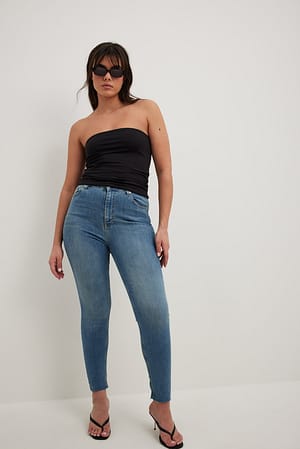 Mid Blue Skinny jeans med høyt liv og grov kant