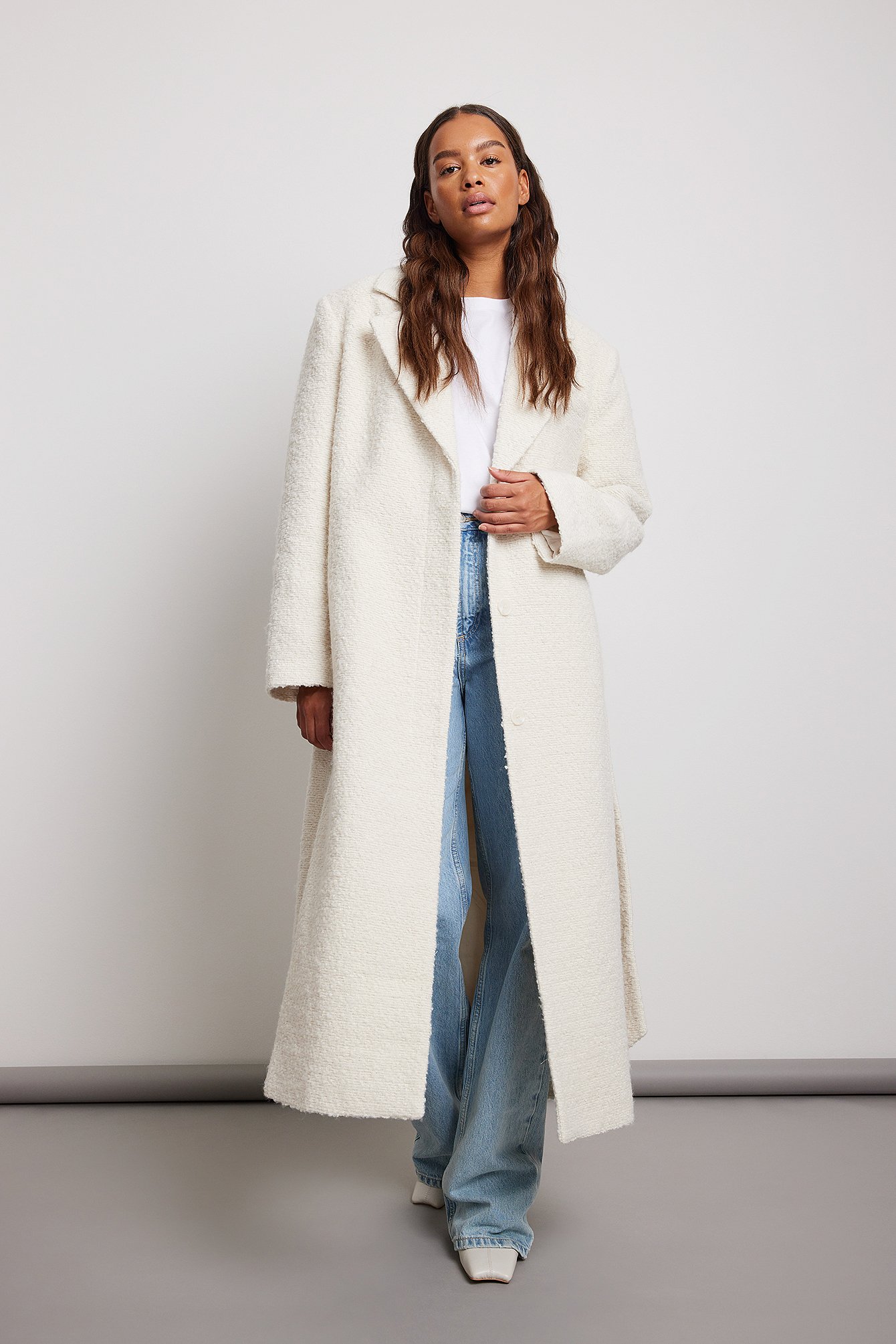 belted white coat