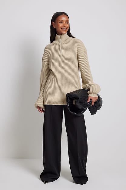 Beige High Neck Zipped Knitted Sweater