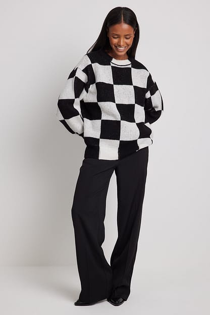Black/White Knitted Mock Neck Checkered Sweater