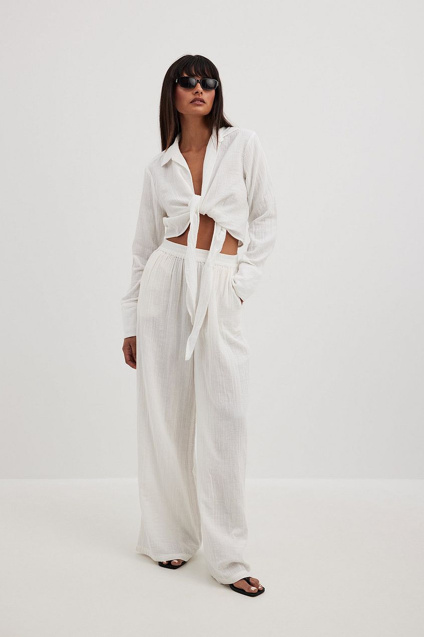na-kd.com | Structured flowy pants with an elasticated waist