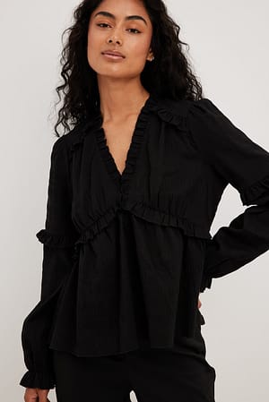 Black Recyklingowana teksturowana bluzka z falbankami z długim rękawem