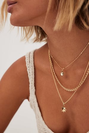 Gold Mehrlagige Halskette mit Sonnendetails