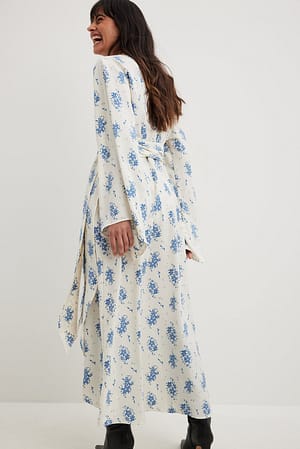 Kalmte nieuwigheid Eenheid Maxi-jurk met lange mouwen en strikdetail Bloem | NA-KD