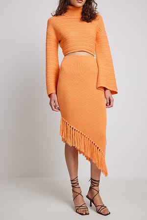 Orange Asymmetrisk kjol i ullblandning med fransig nederkant