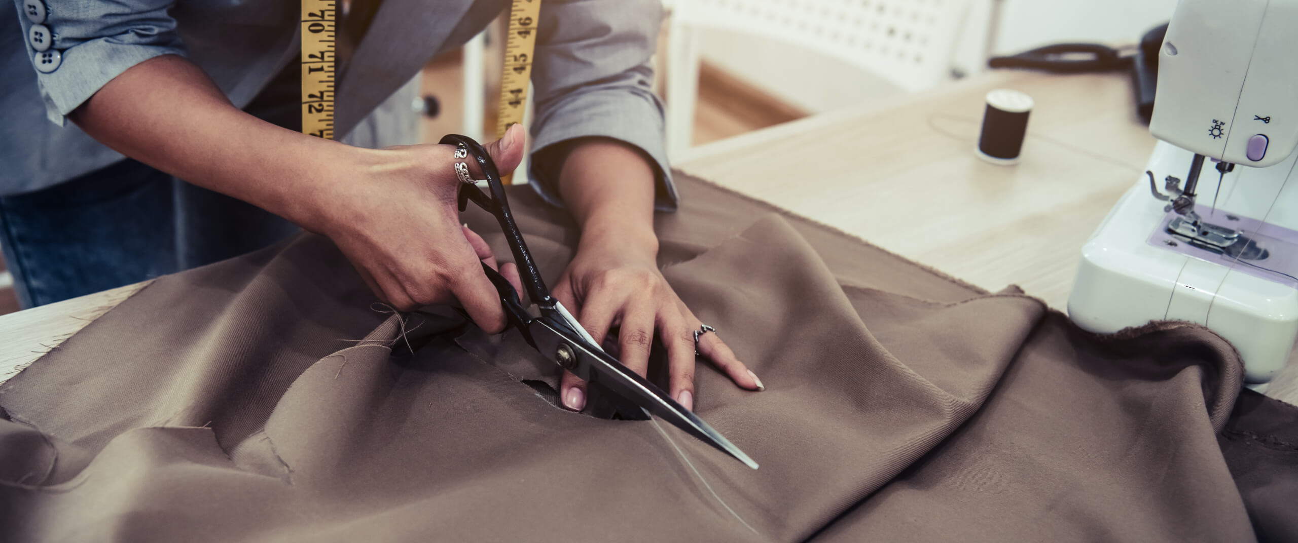 Woman cutting fabric