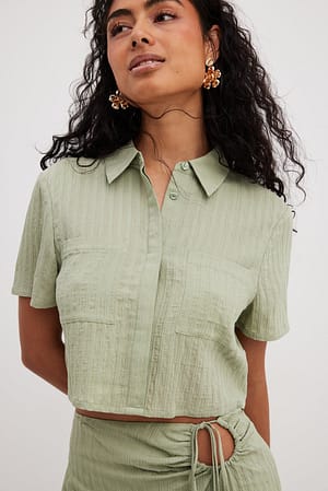 Soft Green Overhemd met korte mouwen en knopen aan de voorkant