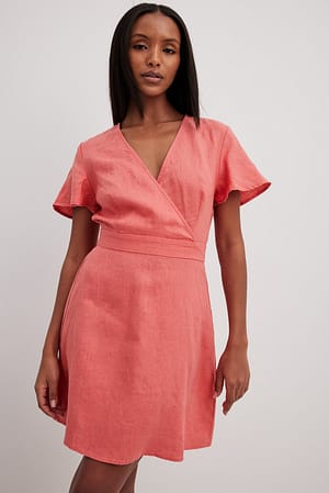 Coral Pink Linnen flowy mini-jurk met strik op de rug