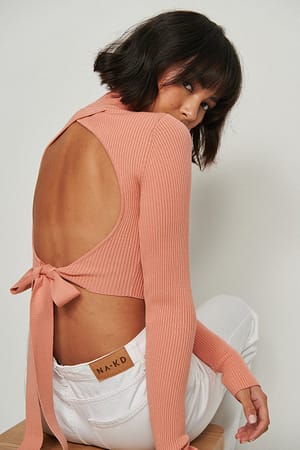 Pink Ribgebreide trui met open rug