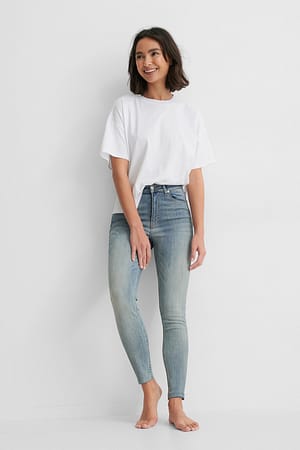 Washed Blue Skinny jeans met hoge taille en onafgewerkte zoom
